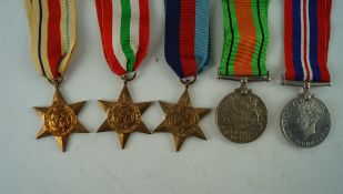 A five piece WWII medal group, awarded to Harold Arthur Carter,