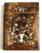 A 19th century tortoiseshell and mother of pearl Inlaid card case,