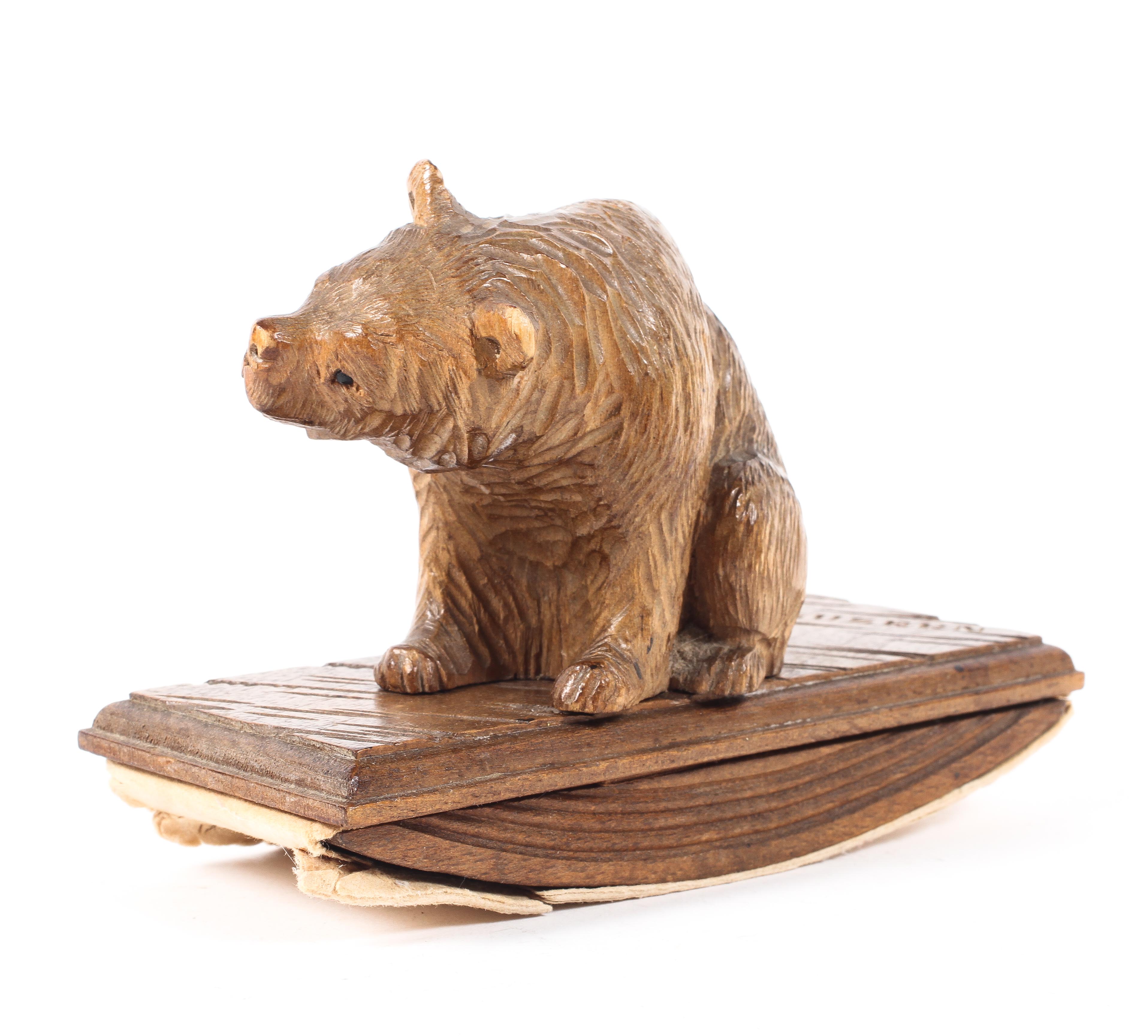 A carved Black Forest style blotter surmounted by a seated bear inscribed LUZERN,