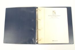 A folder containing The 1948 Silver Wedding Omnibus Stamp Collection