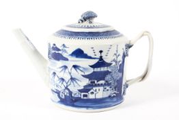 A 19th century Chinese export teapot decorated in blue and white with pavillions in a landscape