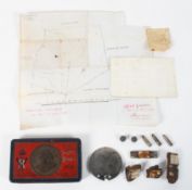 A South Arican 1900 Victorian Thankyou Tin of assorted military remnants, bullets and more,