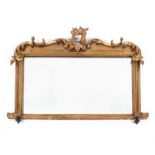 A 19th century gilt framed overmantle mirror with original glass with leaf pelmet,