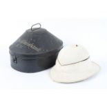 A Gieves Ltd Royal Naval Outfitters London W 71/4 pith helmet in original hat tin inscribed D.F.