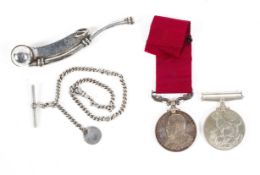 An Edward VII long service medal, a 1939- 1945 medal,