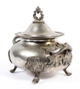 A large late 19th/early 20th century silver plated lidded tureen with cast loop handles and feet,