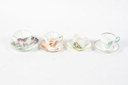 Three Shelley teacups and saucers and a coffee can and saucer, printed green marks,