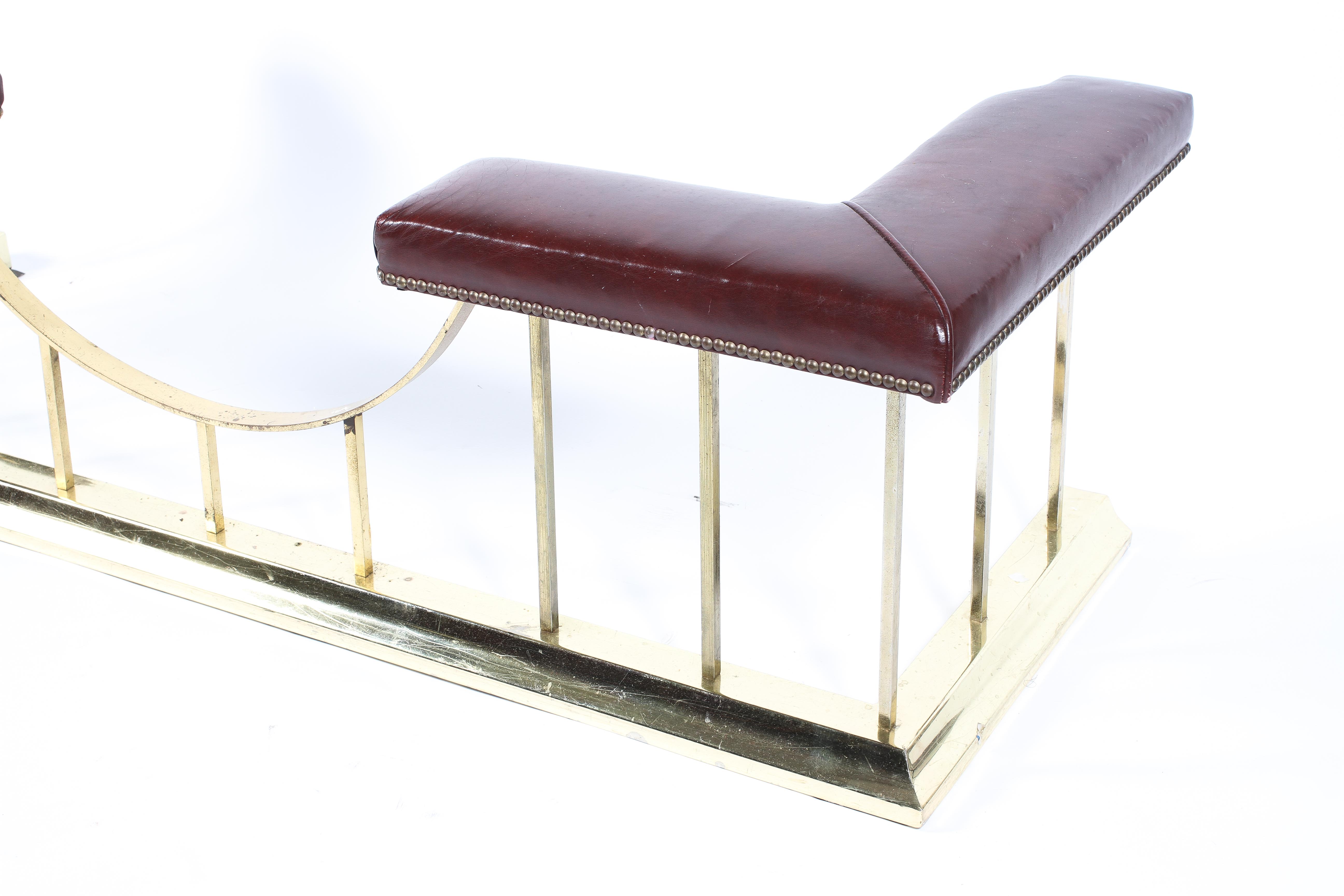 An Edwardian style brass and red leather padded and studded fire fender, - Image 2 of 2