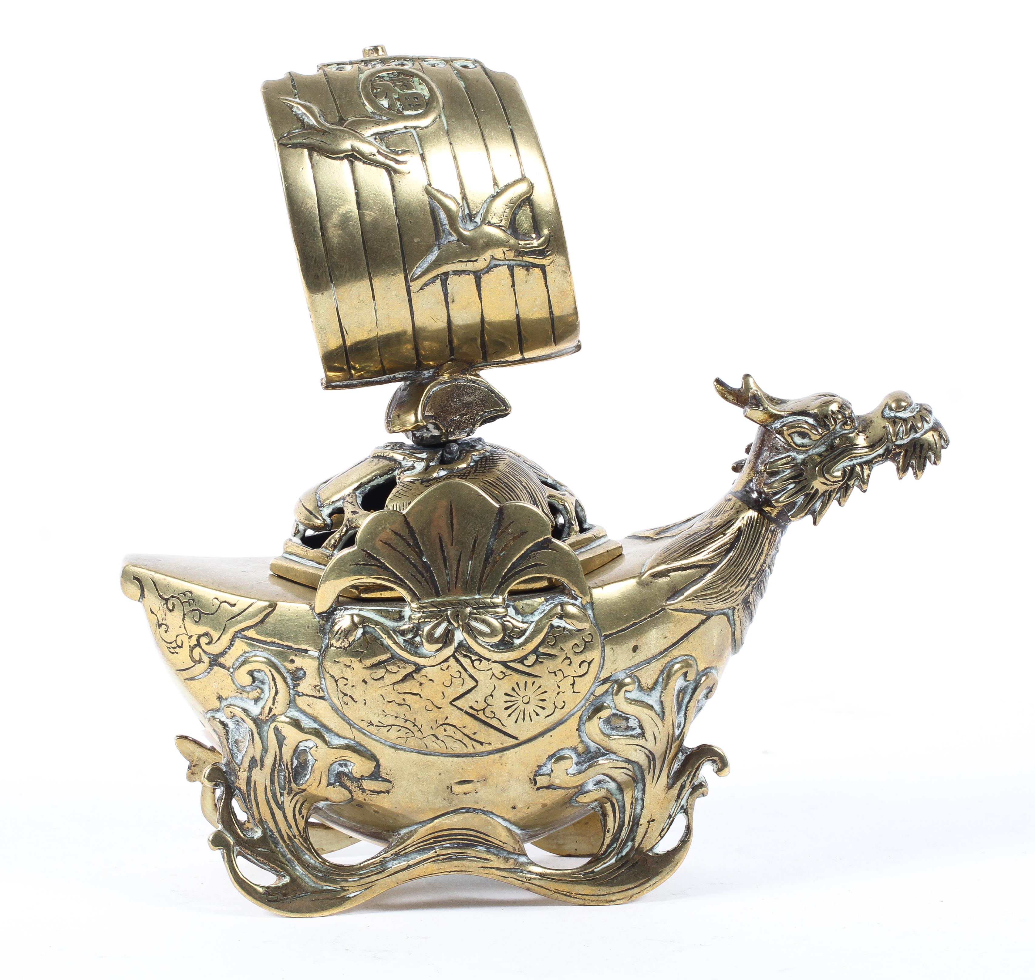 Chinese gilt-bronze ship-shaped pot and cover, the pierced domed cover surmounted with a sail,