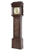 A 19th century oak 8 day longcase clock, the case with all over carved decoration,