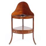 An Edwardian mahogany corner washstand,