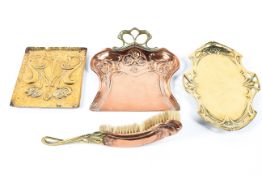 A collection of Art Nouveau brass and copper wares, including a WMF pierced brass shaped oval tray,