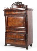 A 19 th century flame mahogany secretaire chest with acanthus pediment above a single drawer