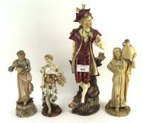 Four ceramic figures, one being a Royal Worcester figure, and other examples