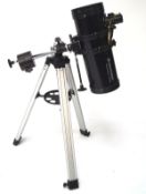 A Celestron powerseeker 127eq telescope,