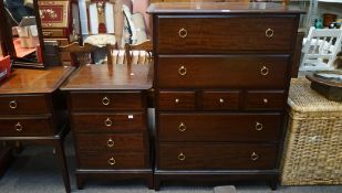 A contemporary mahogany chest of drawers and a matching bedside table