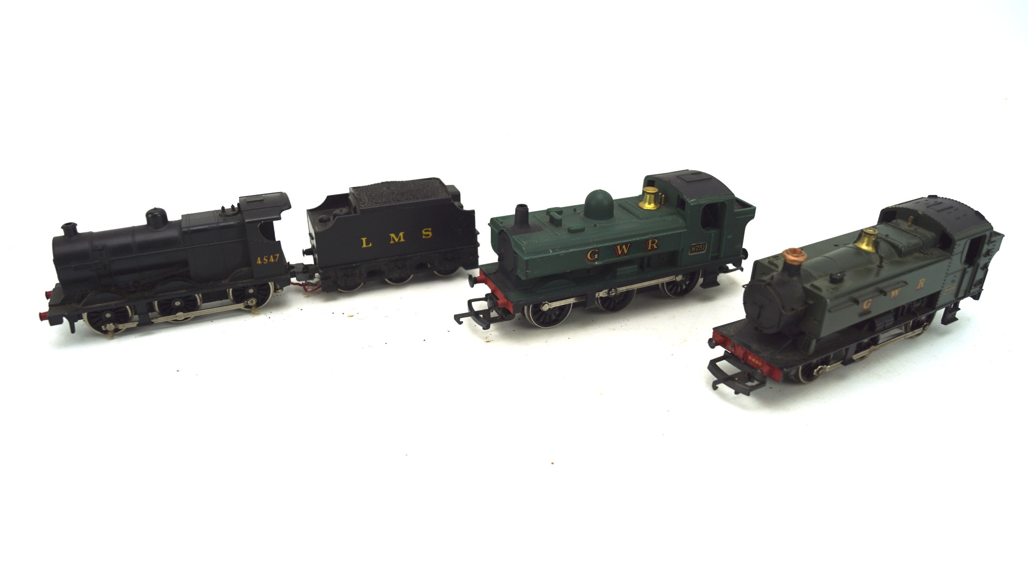 Three Lima locomotives and a tender,