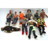 A collection of Action Man figures, together with villains, in assorted outfits,