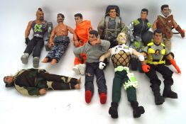 A collection of Action Man figures, together with villains, in assorted outfits,