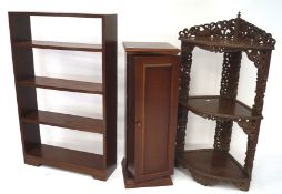 A wooden corner cabinet, CD cabinet and bookshelf,