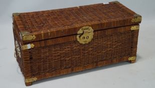 An oriental style brass mounted wicker storage box, of rectangular form,