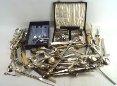 A selection of assorted silver plated and stainless flatware,