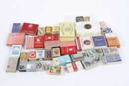 A large selection of cigarette boxes, including examples for 'Bryman', 'Tenner', 'Everest' and more,