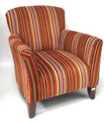 A contemporary tub chair, upholstered in striped fabric, raised on wooden supports,