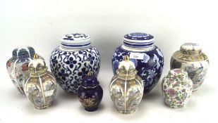 Collection of contemporary lidded porcelain ginger jars, some decorated in blue and white,