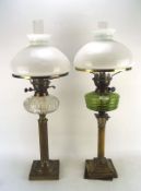 Two early 20th century brass oil lamps,