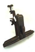 A vintage cast metal saw sharpener by Henry Disston & Sons,
