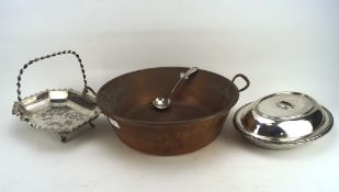 A twin handled copper pan and a collection of silver plate,