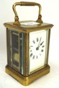 A late 19th century repeating 8 day brass cased carriage clock,