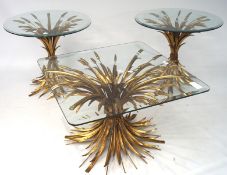 Three contemporary brass and glass tables, the stands in the form of sheaves of corn,