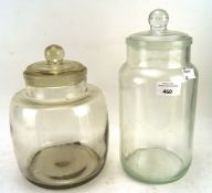 Two vintage glass lidded storage jars,