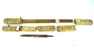 A Japanese bone cased saya, highly decorated throughout with traditional carved scenes,