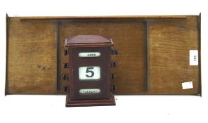 A vintage Acuview bookstand and a desktop calendar,