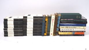 A collection of books, including 'The Chronicles of London', and more