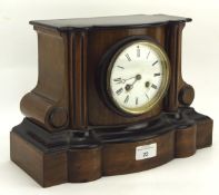 An Edwardian mantel clock, the white enamel dial with Roman numerals,