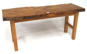 A contemporary rustic plank top coffee table,