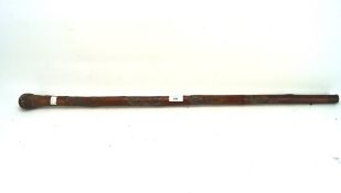 A late 19th/early 20th century Japanese carved bamboo walking cane