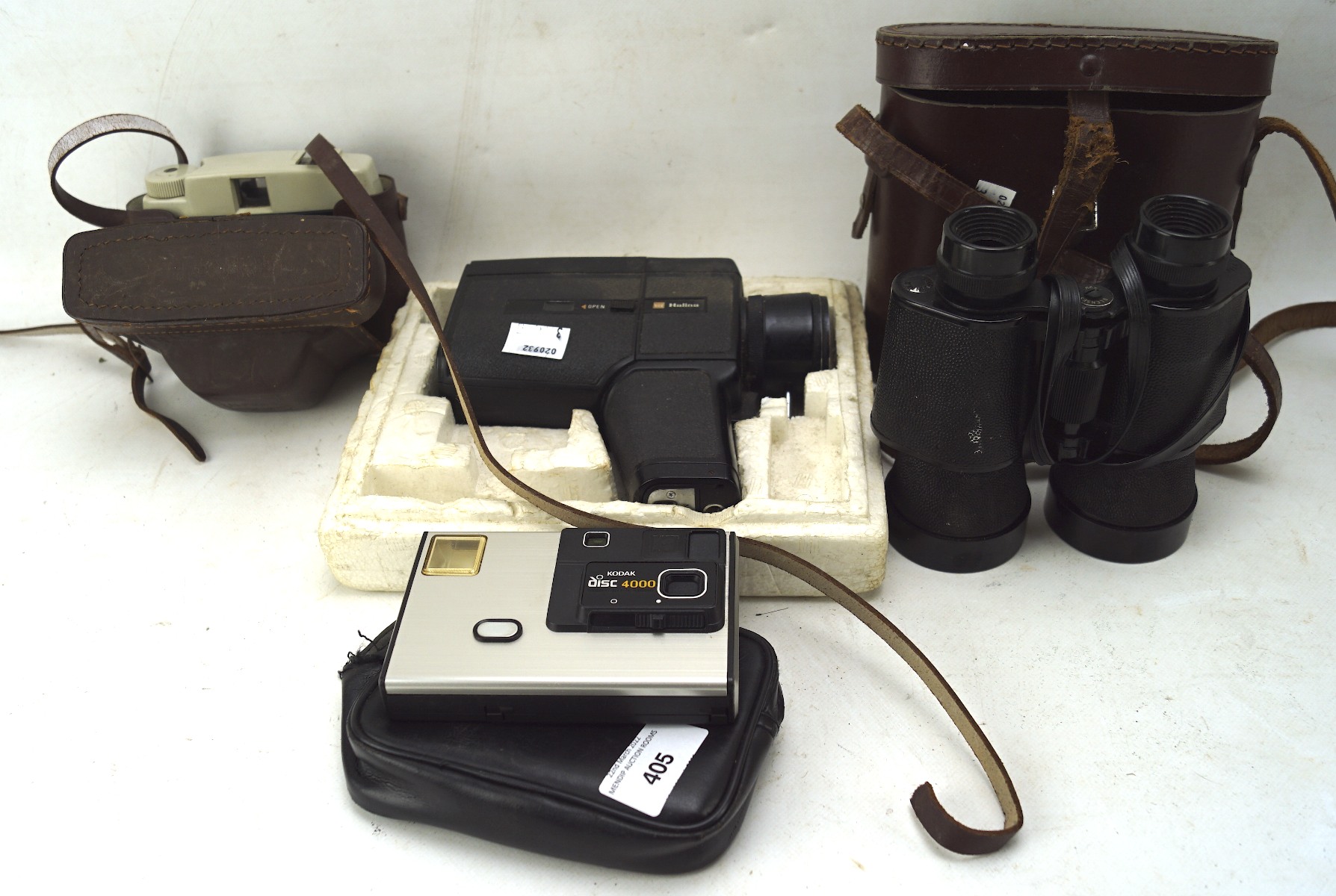 A pair of binoculars, Ilford Sporti 4 camera, a Hallina Super 8, and more
