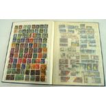 A vintage stock book containing a selection of French stamps,