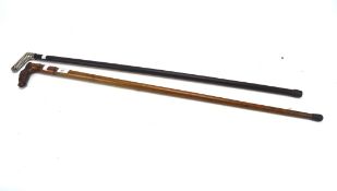 A Malacca walking stick with horse head handle and a French rope twist handled three section cane