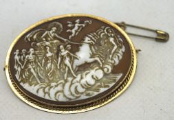 A 9ct gold oval carved cameo brooch, with carved scene depicting horses and figures,