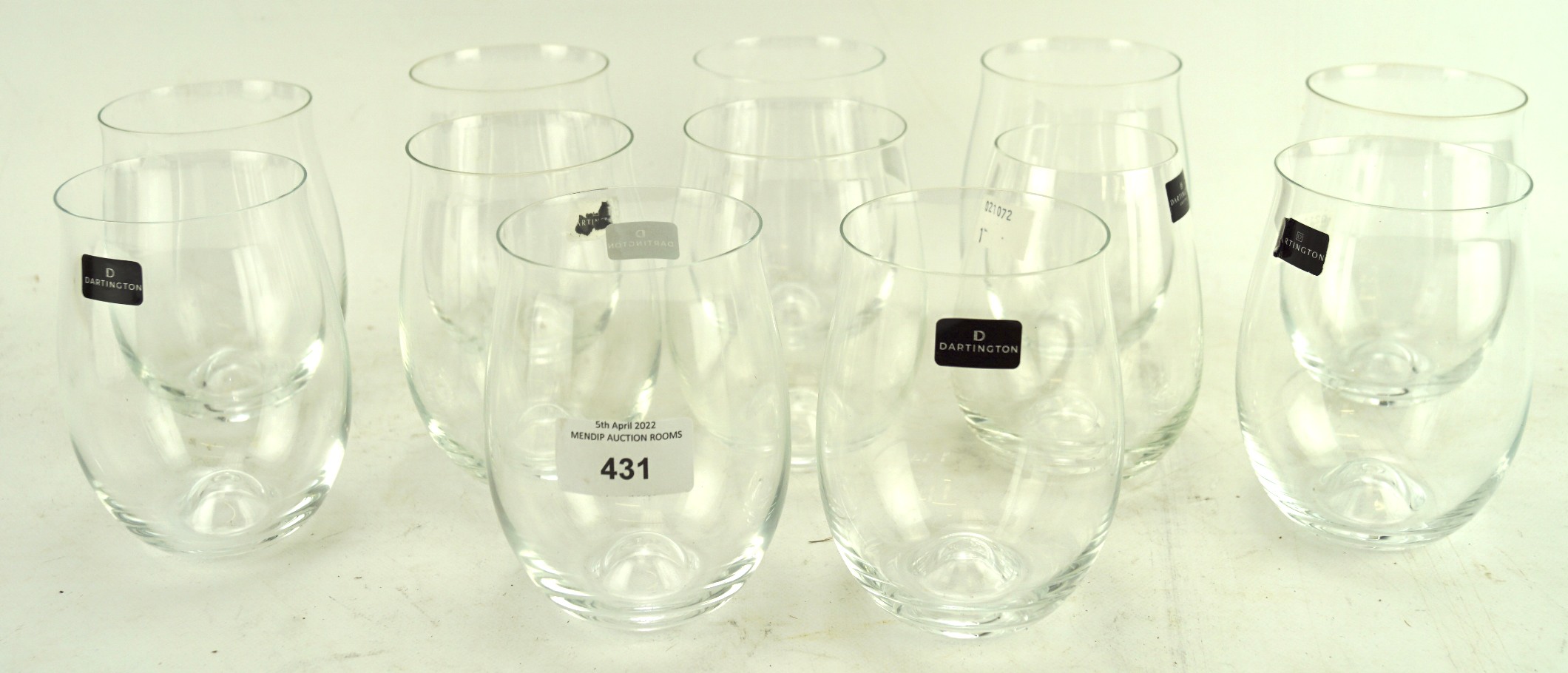 A selection of twelve Dartington crystal glass stemless wine glasses,