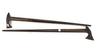 Two native Indian walking sticks,