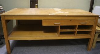 A mid 20th century beech effect work table,