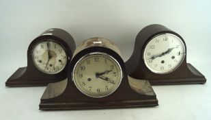 Three early/mid 20th century wooden mantle clocks,