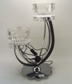 A contemporary chrome and glass table lamp,